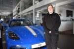 Emily with a Porsche