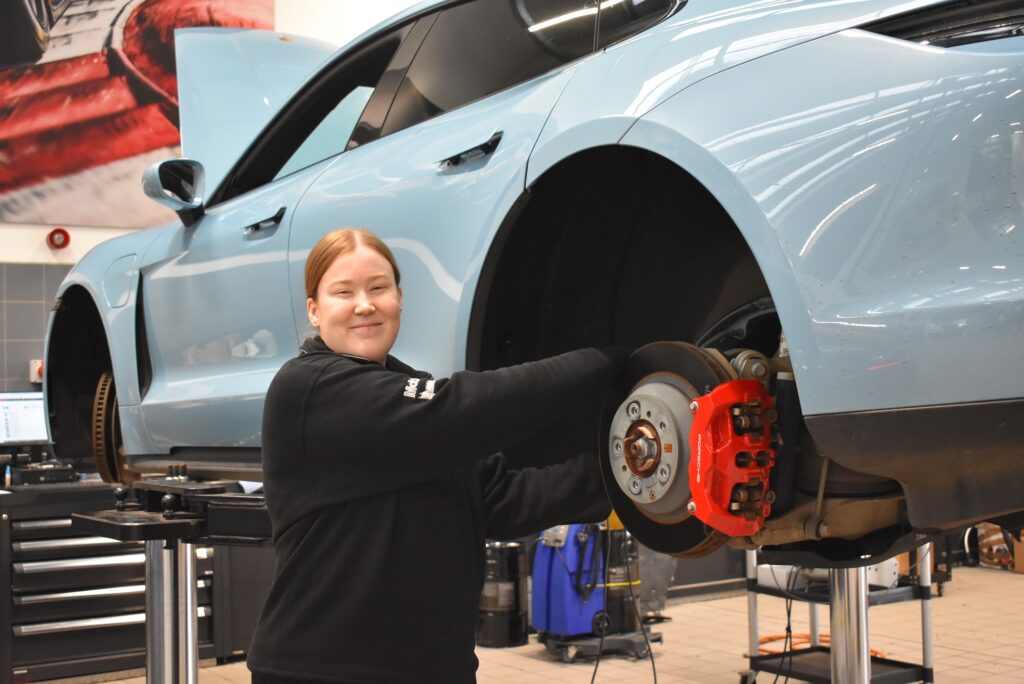 Emily in the Porsche workshop