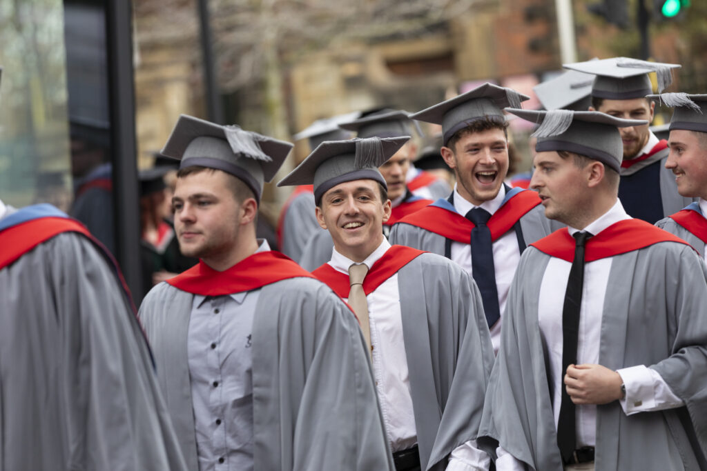 Graduates walking through Stockton