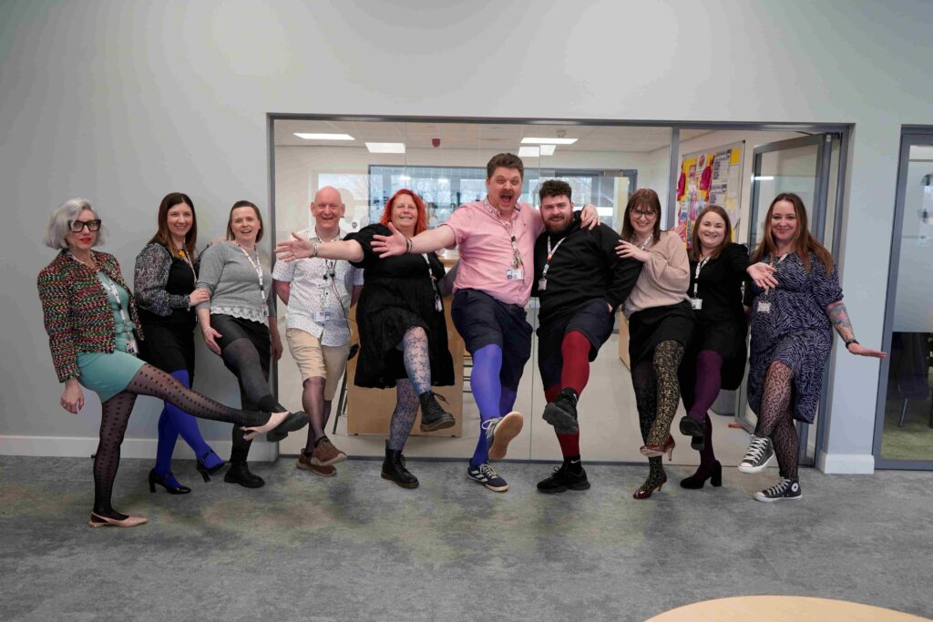 Stockton Riverside College staff wear funky tights for Cancer Research UK