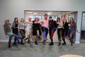 Stockton Riverside College staff wear funky tights for Cancer Research UK