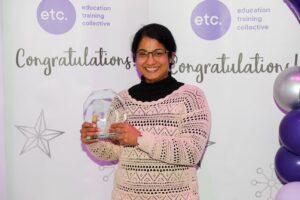 Tomina wins the Etc Rising Star award at the Etc. staff awards