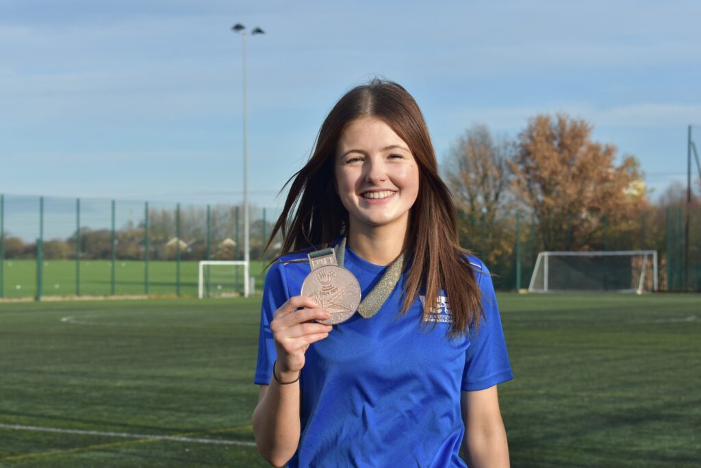 Sophie with her Deaflympics bronze medal