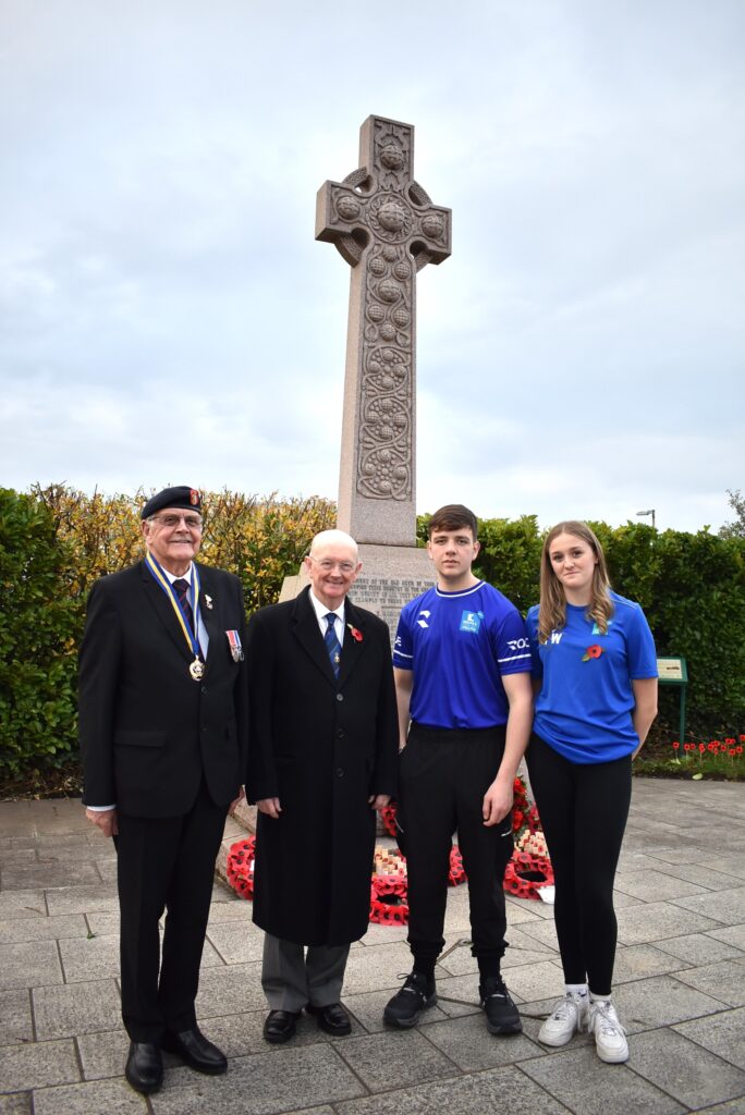 Students and guests pay tribute to the fallen at Sir William Turner's School Remembrance Service at Redcar and Cleveland College